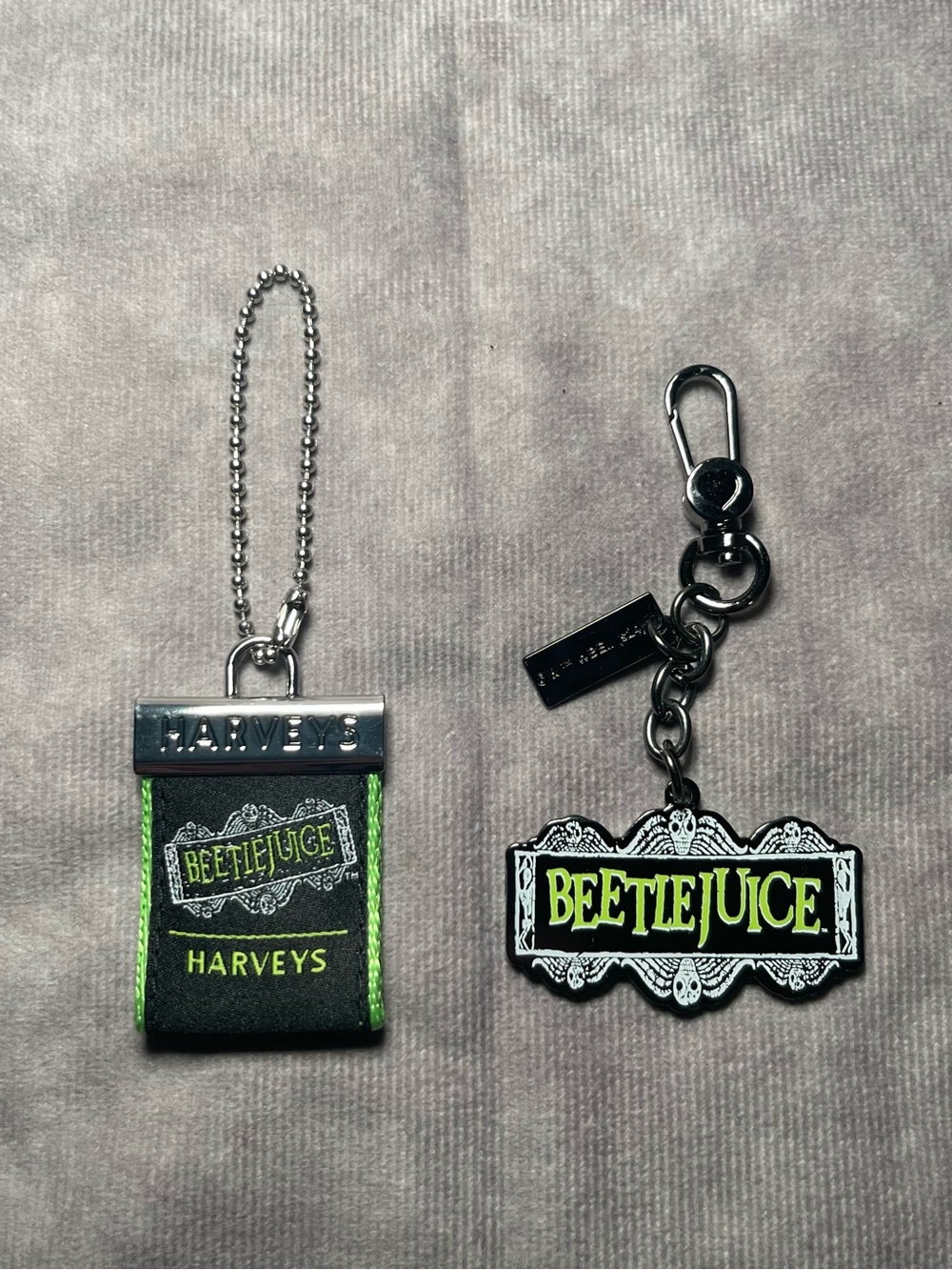 Harvey’s seatbelt brand Beetlejuice double sided logo charm and hangtag